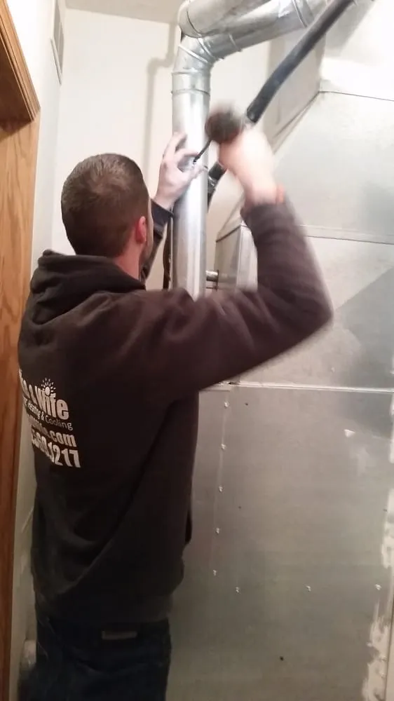 Slide of Mike & Wife Plumbing, Heating & Cooling