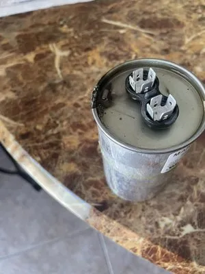 Ming's Air Conditioning Logo