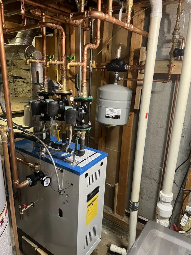 Slide of MJ Plumbing & Heating