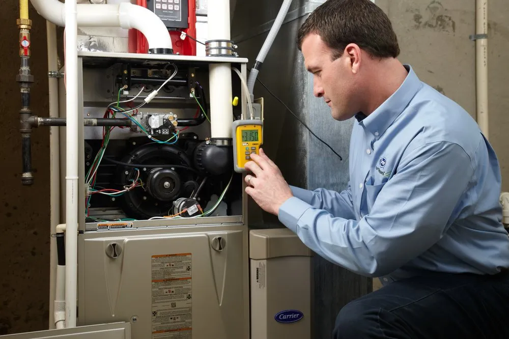 Emergency air conditioning service in Honor, MI by Moore Mechanical