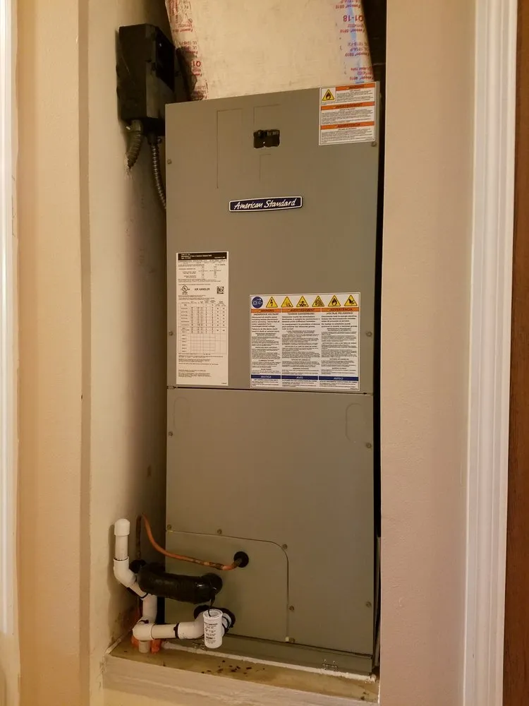 Slide of Moore's Air and Heat