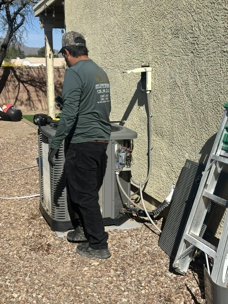 Slide of Mr. John Air Conditioning, Heating & Solar Energy