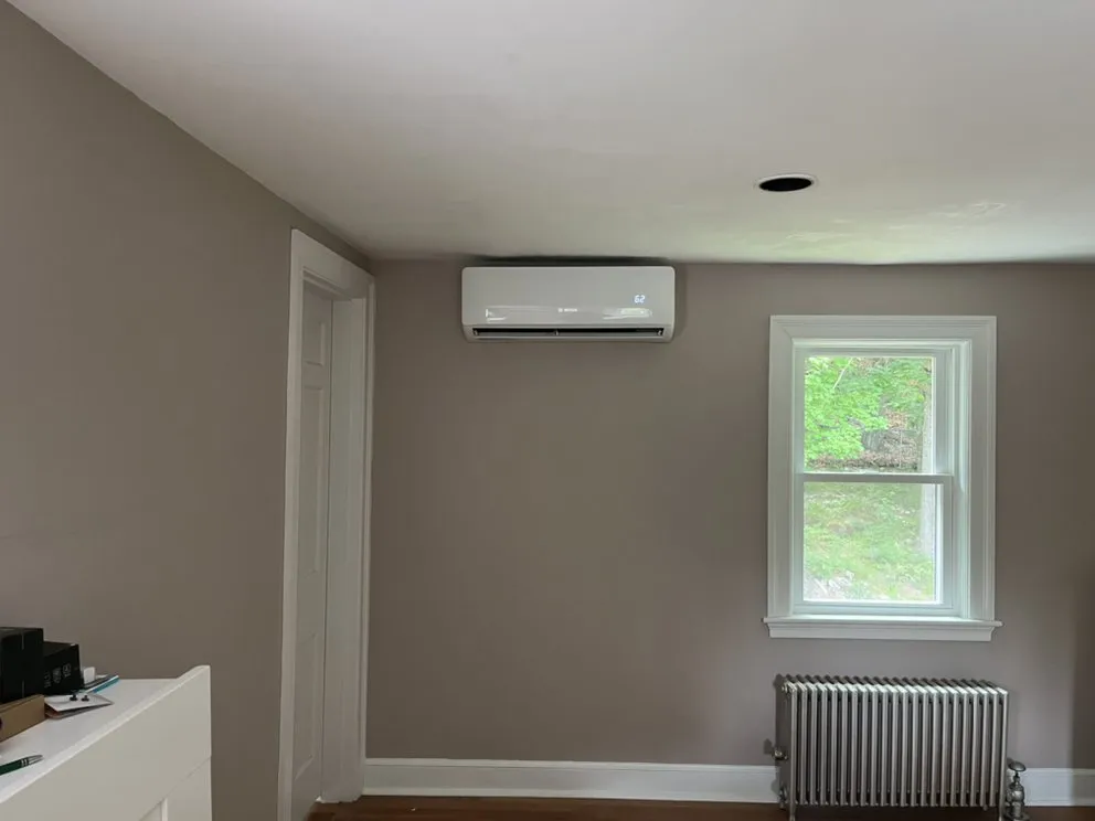 Slide of New England Air HVAC