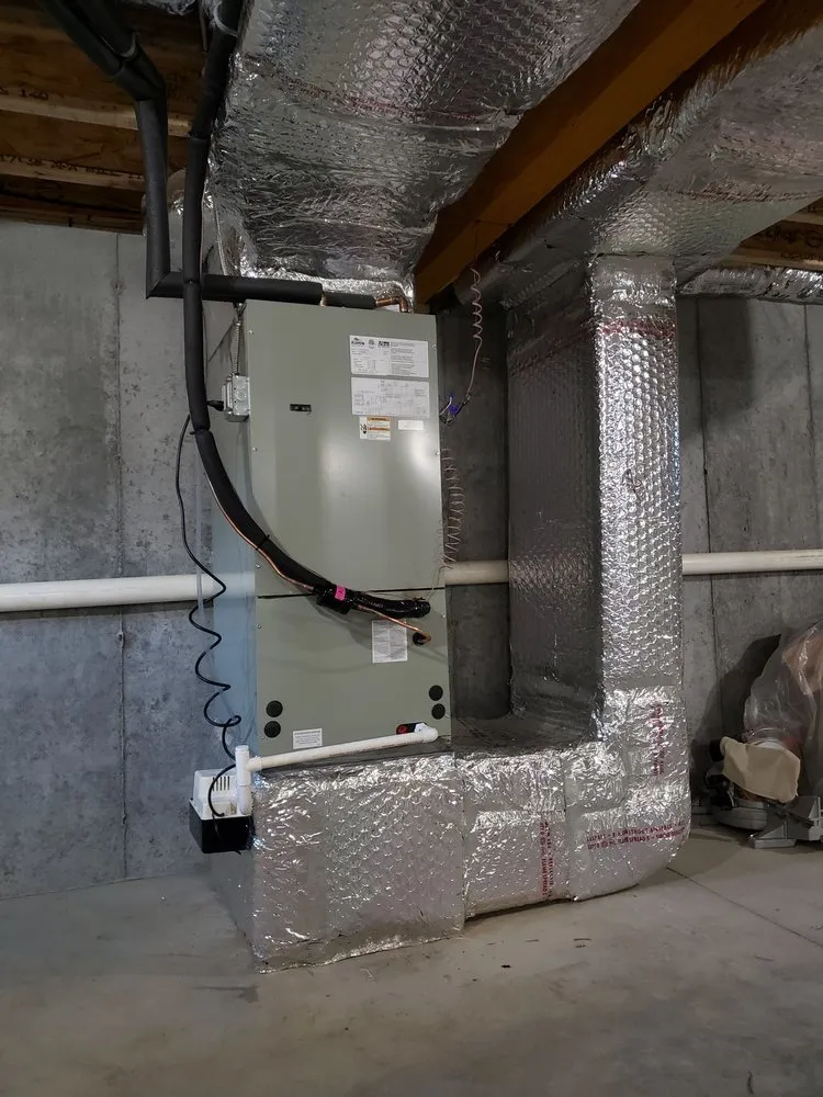 Slide of New England Sheet Metal Inc.