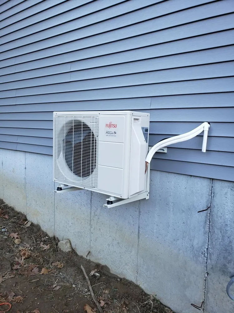 Slide of New England Sheet Metal Inc.