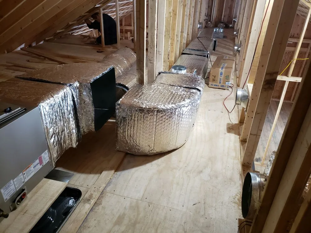 Slide of New England Sheet Metal Inc.