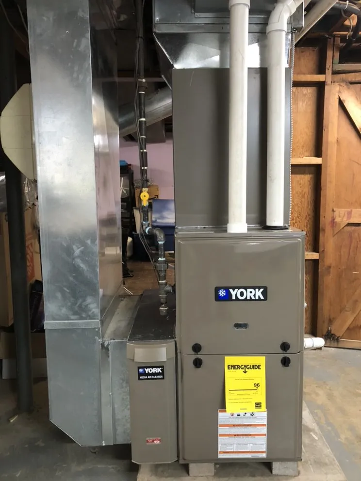 Slide of New Era Heating & Cooling