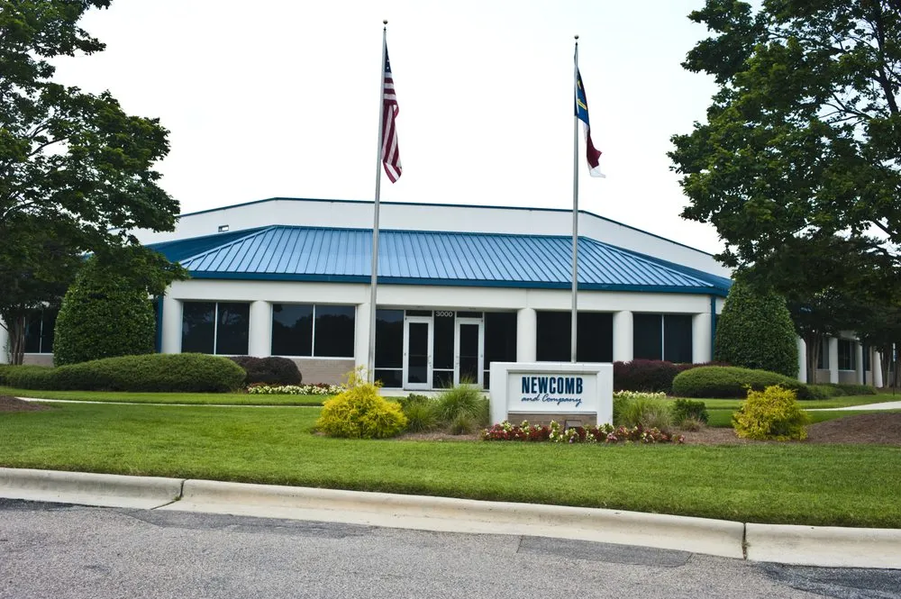 Slide of Newcomb and Company