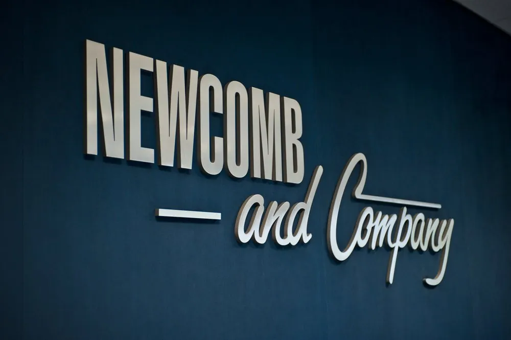 Slide of Newcomb and Company