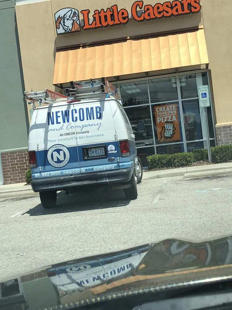 Slide of Newcomb and Company