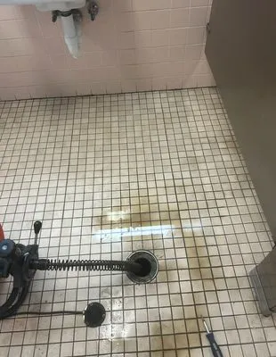 Nick and Lou Plumbing and Heating Logo