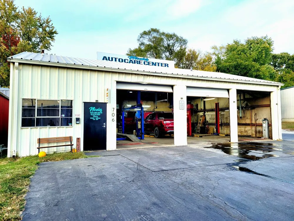 Slide of Nicole's Auto Care Center