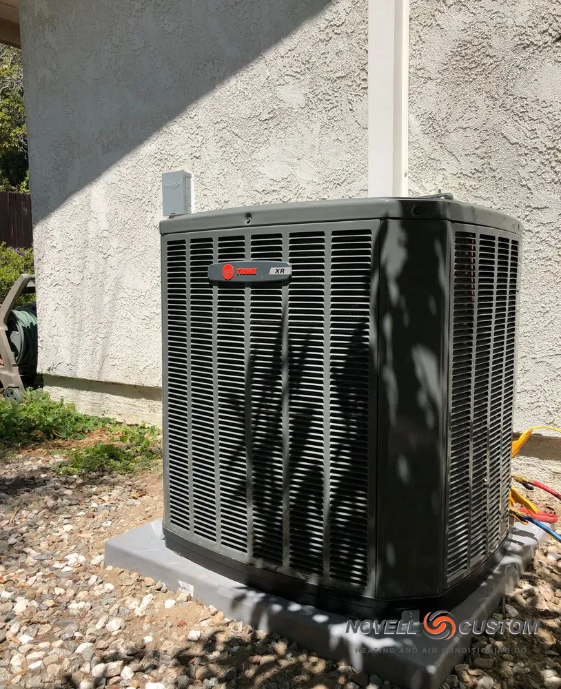 Slide of Novell Custom Heating & Air Conditioning