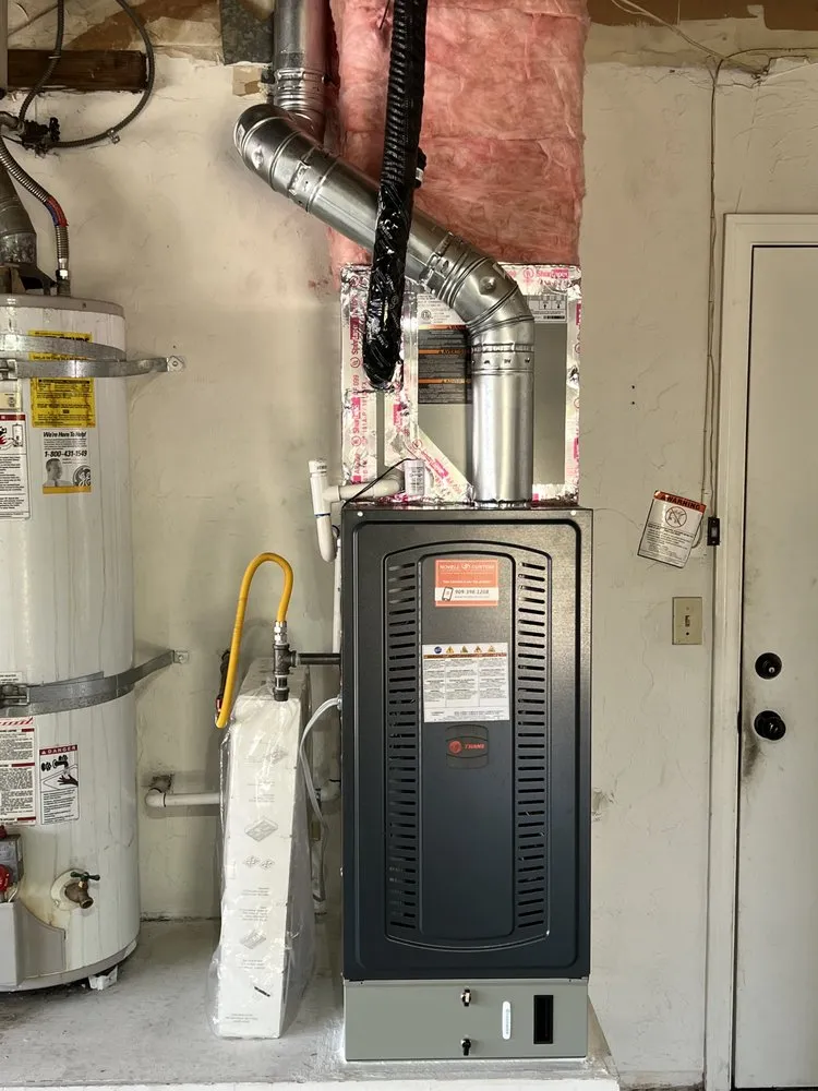 Slide of Novell Custom Heating & Air Conditioning