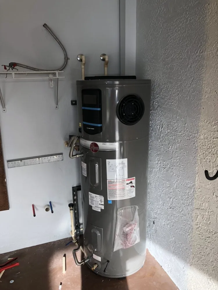 Slide of Oscars and Paul Plumbing & Mechanical