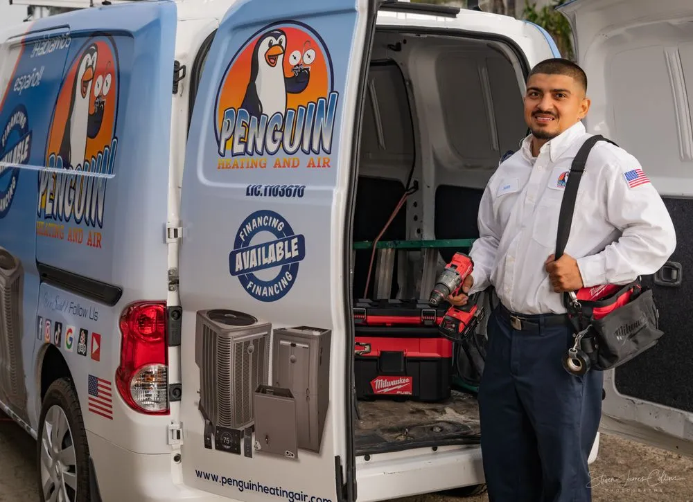 Slide of Penguin Heating And Air