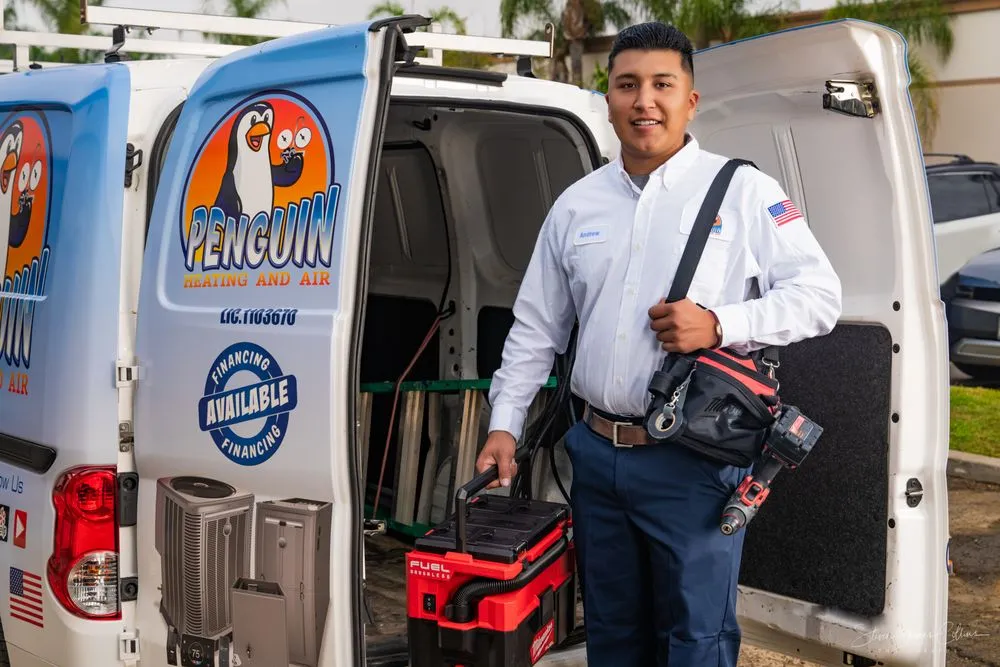 Slide of Penguin Heating And Air