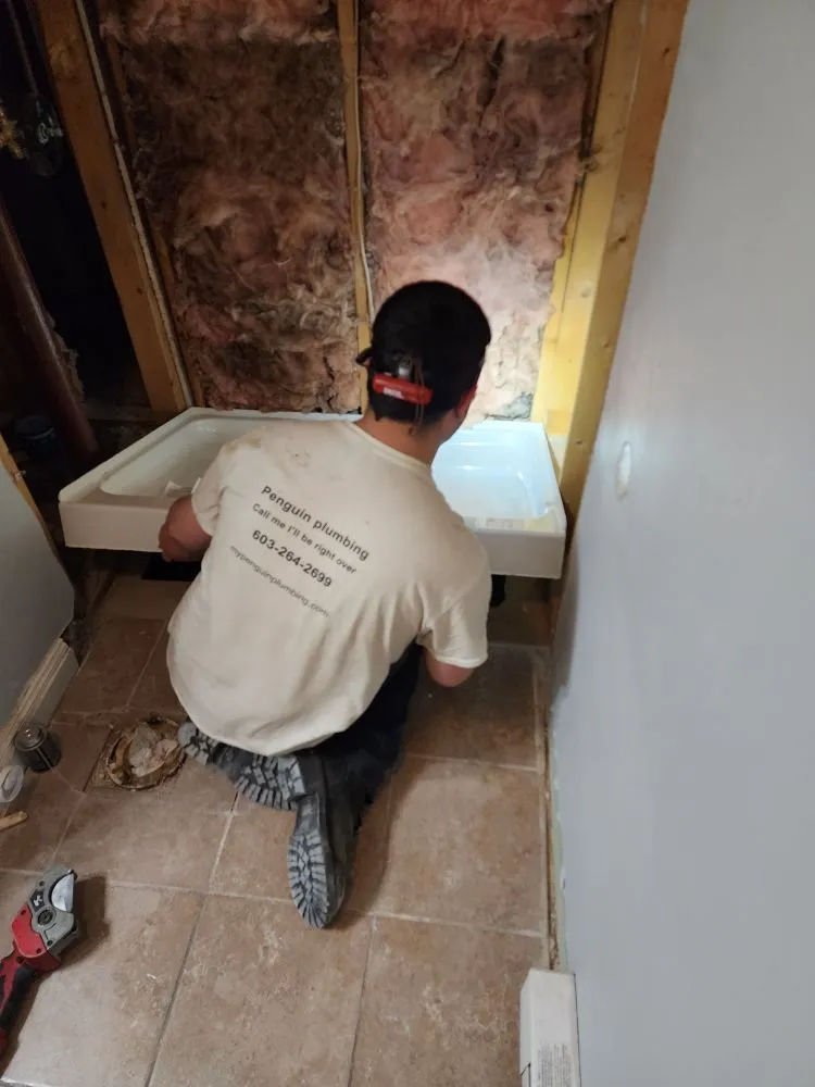 Slide of Penguin Plumbing Heating Cooling