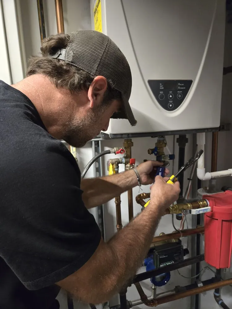 Slide of PG Heating Cooling & Plumbing