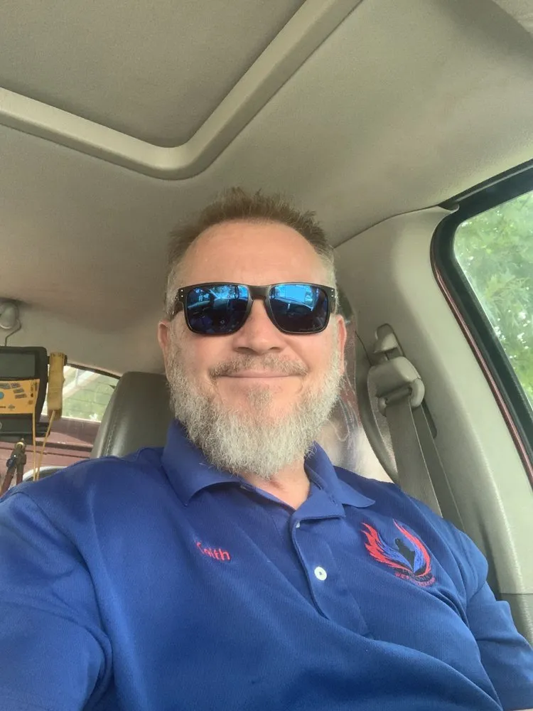 Slide of PHX Heat & Air