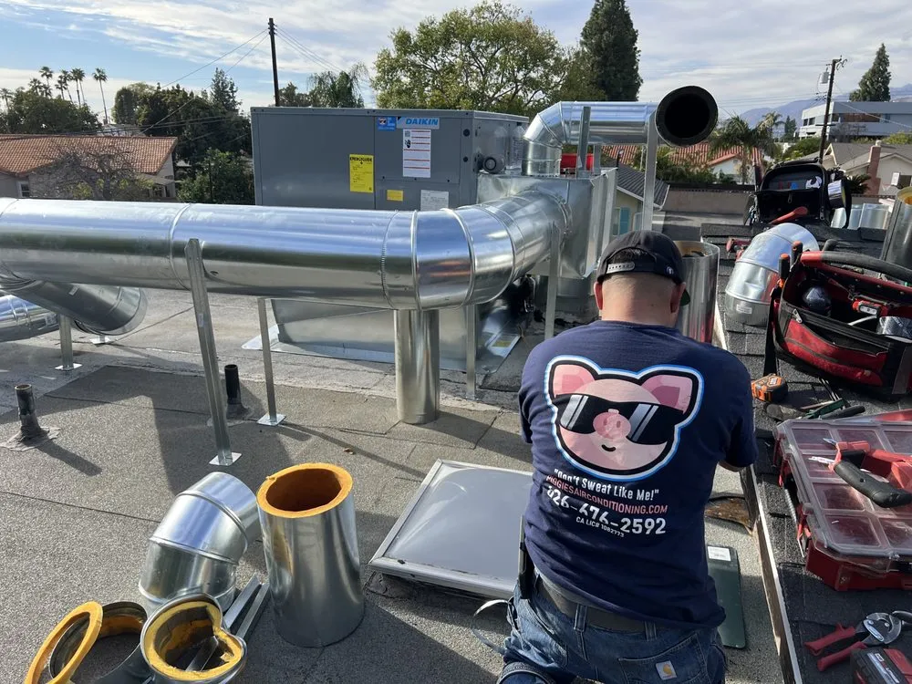 Slide of Piggies Air Conditioning