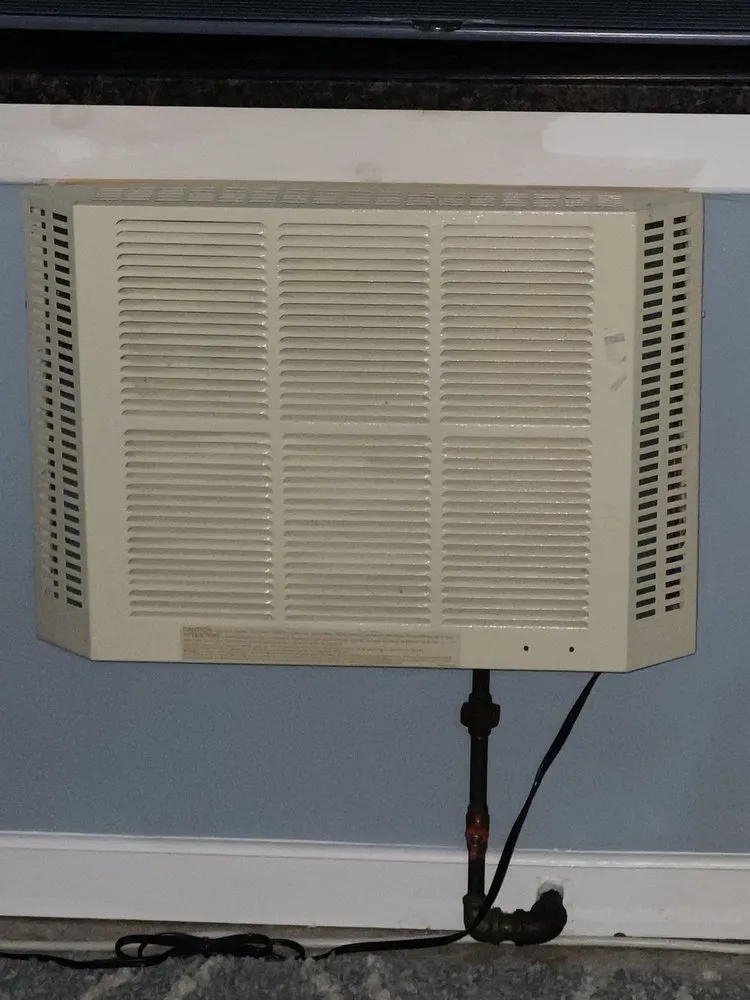 Slide of Plumbing and Heating World