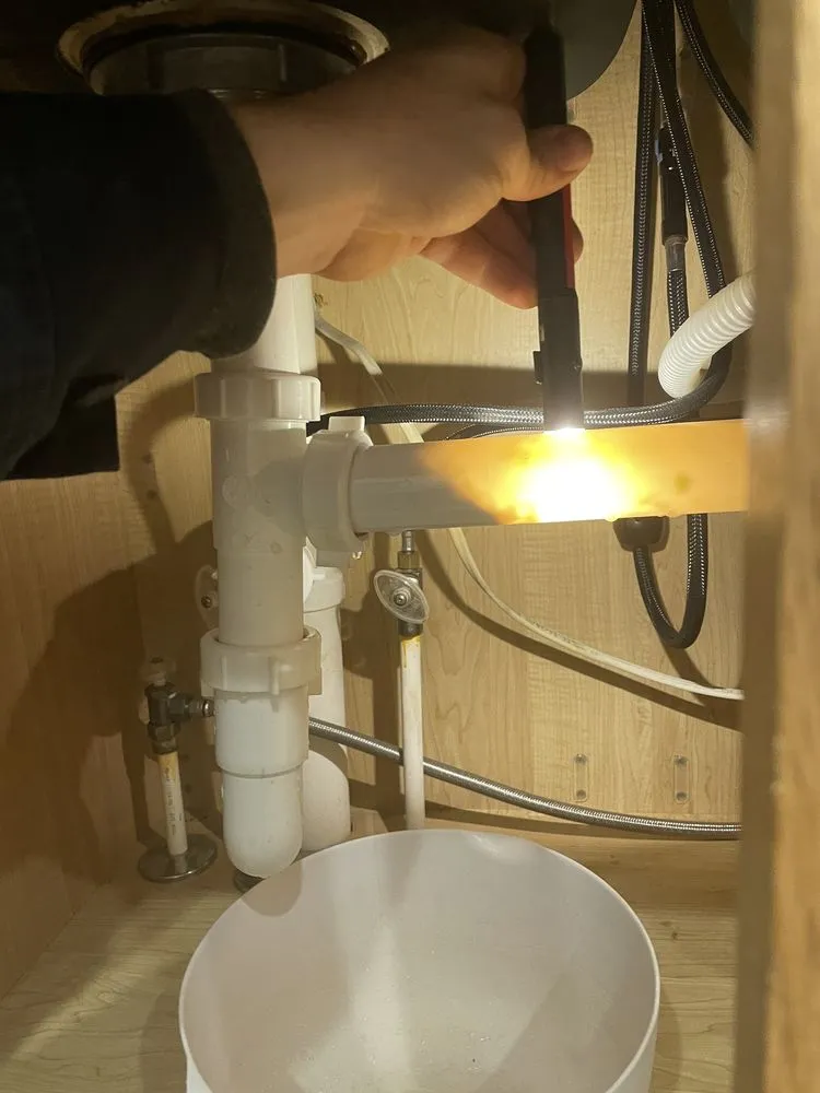 Slide of Powell's Plumbing & Air