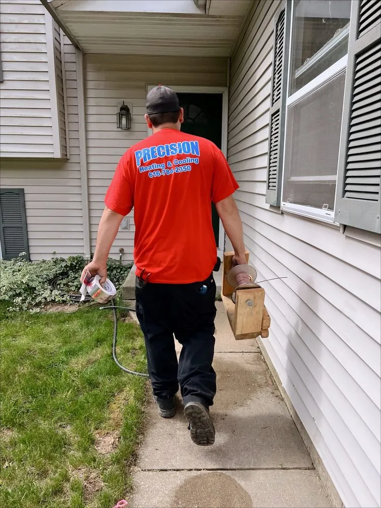 Slide of Precision Heating & Cooling