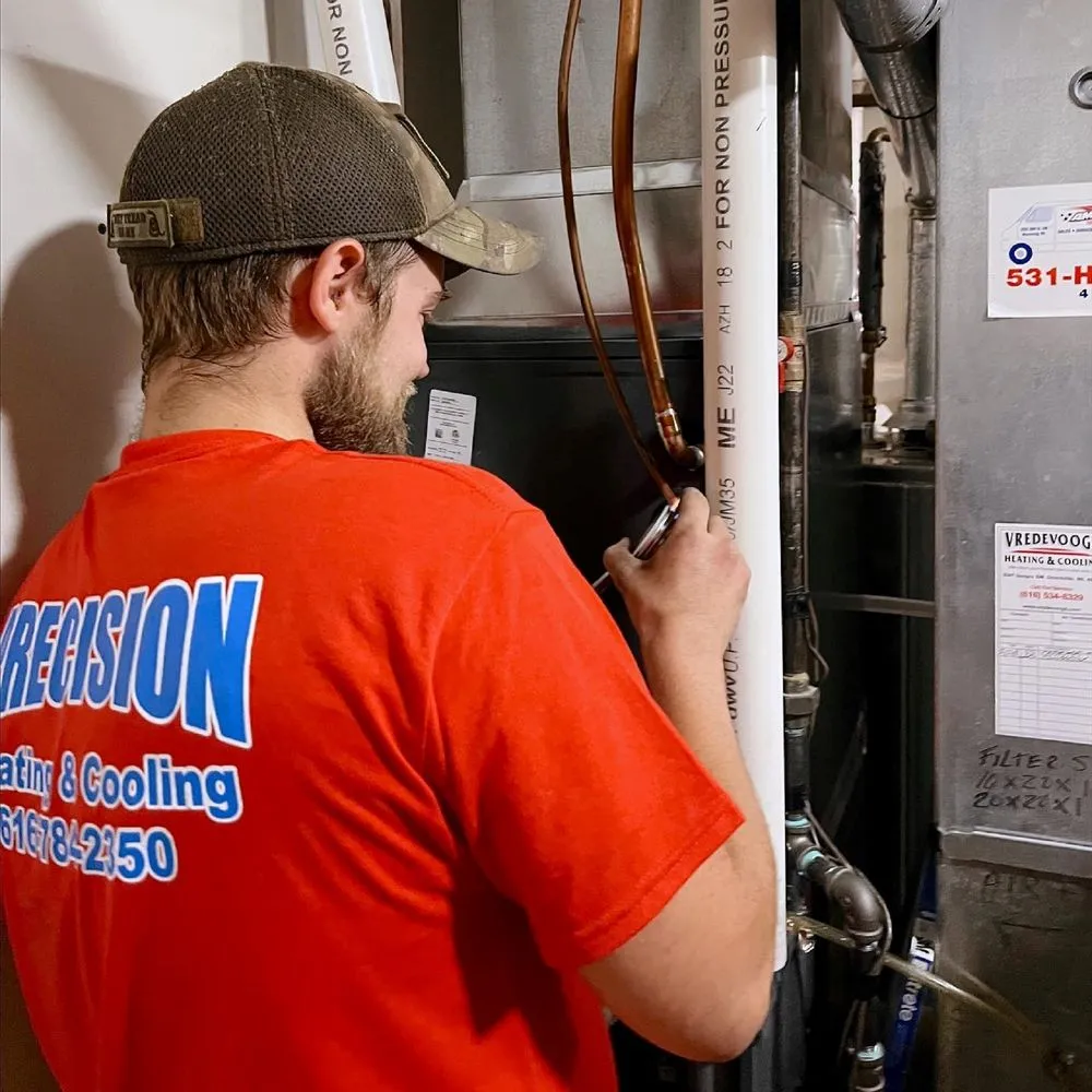 Slide of Precision Heating & Cooling