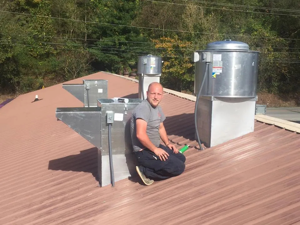 Slide of Precision Heating, Cooling, and Electrical