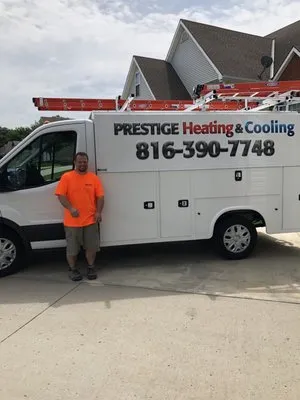 Prestige Heating and Cooling Logo