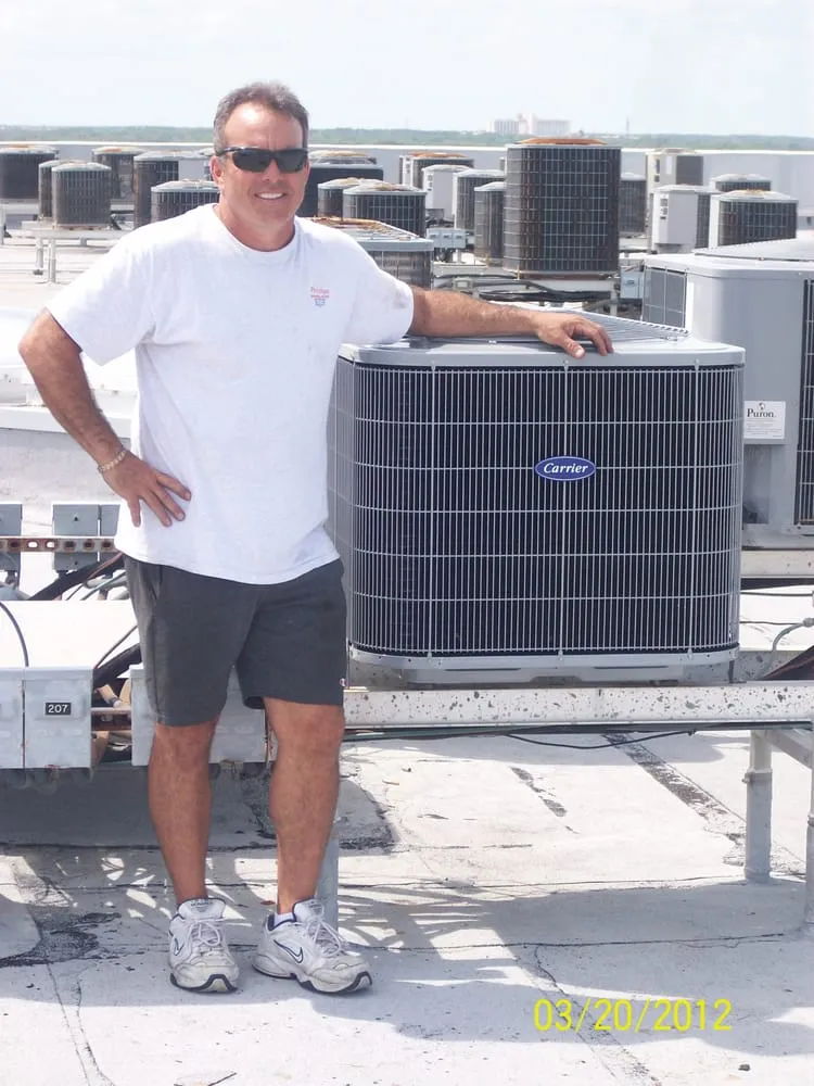 Slide of Prestige Mechanical Services