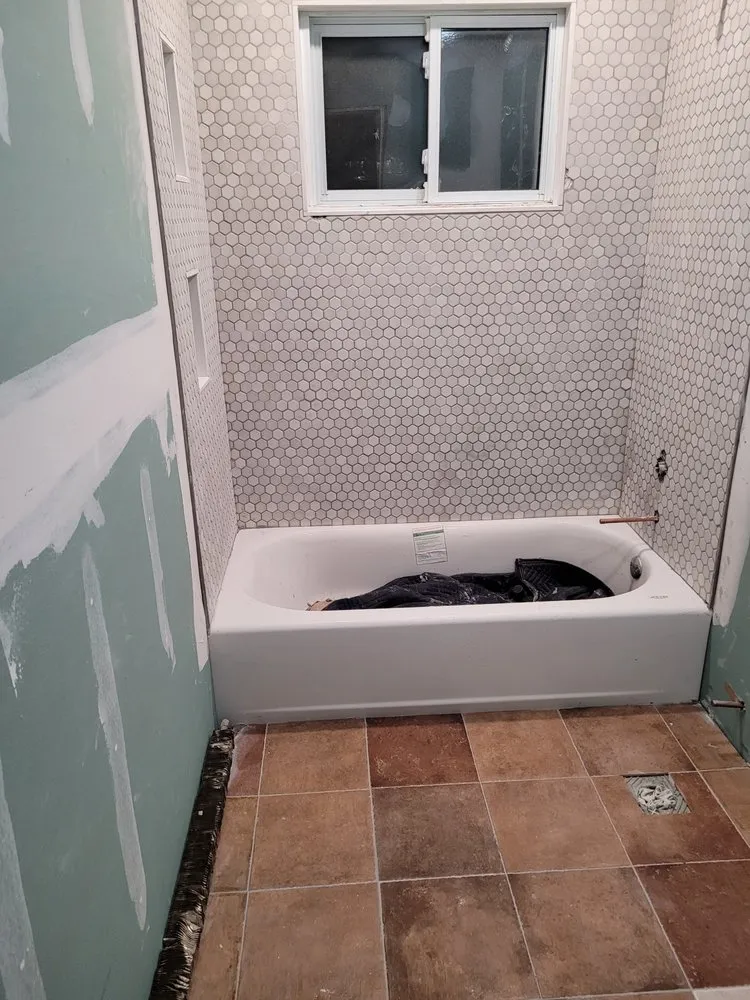 Slide of Qualified Plumbing and Heating Service Of Long Island