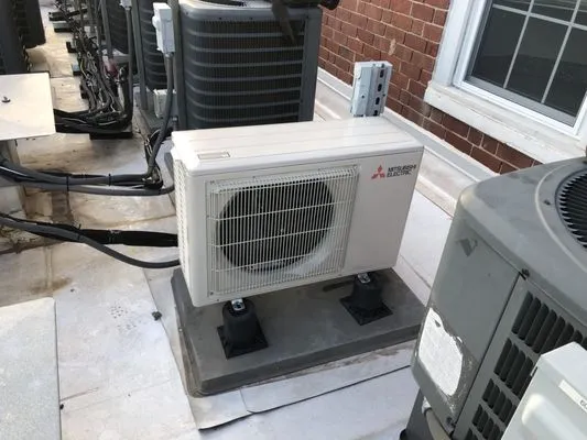 Quality Cooling and Heating Logo