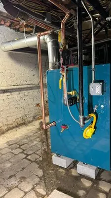 R. Spagnuolo Plumbing & Heating Logo