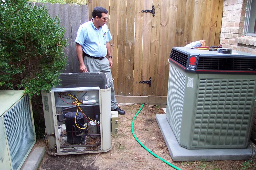 Slide of RAS A/C & Heating Services