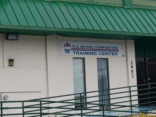 Re Michel Company Logo