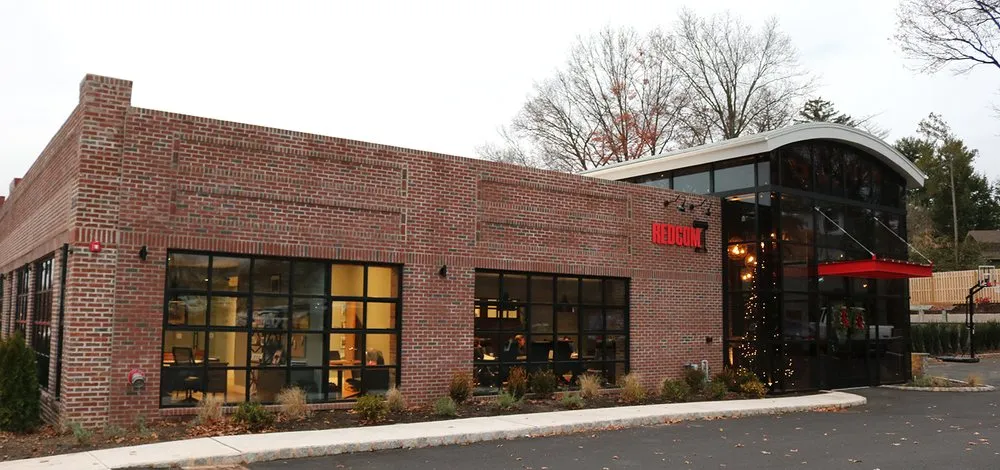 Slide of REDCOM Design & Construction