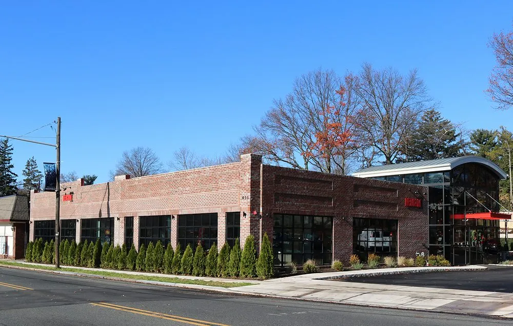 Slide of REDCOM Design & Construction