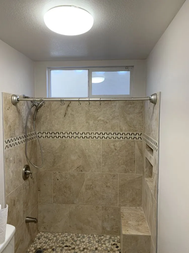 Slide of REV Renovations