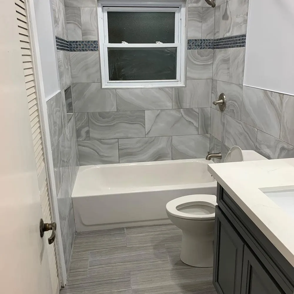 Slide of REV Renovations