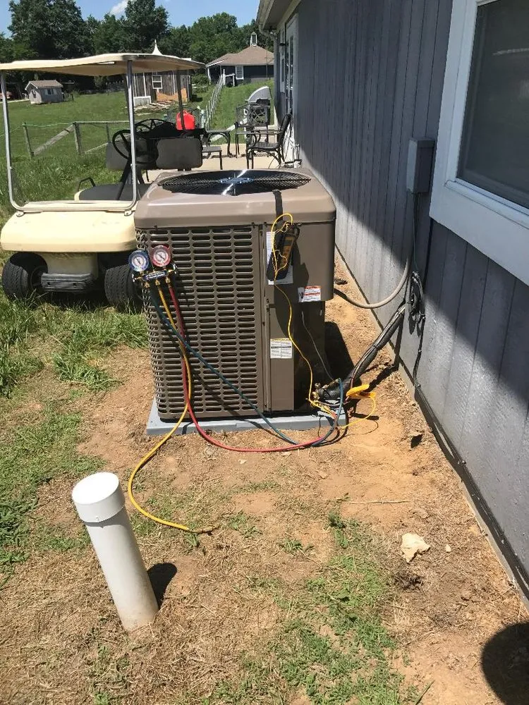 Slide of Rhodes Heating Cooling Plumbing And Rooter