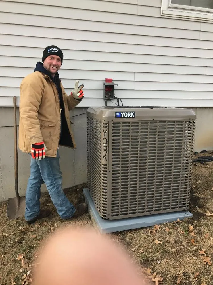 Slide of Rhodes Heating Cooling Plumbing And Rooter