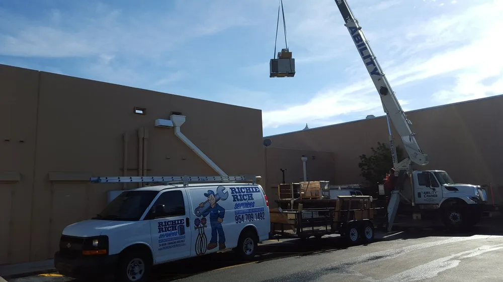 Slide of Richie Rich Services