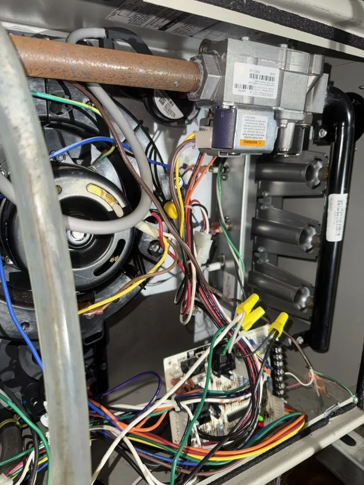 Slide of Ricky’s Heating and Cooling