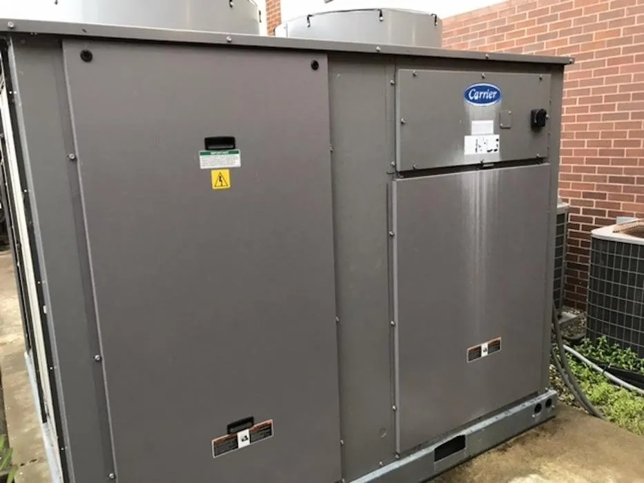 Slide of Roger Touvell Heating, A/C & Refrigeration