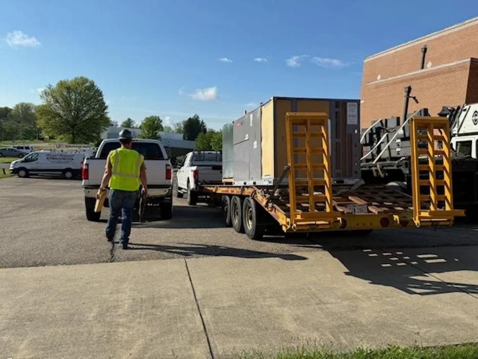 Slide of Roger Touvell Heating, A/C & Refrigeration