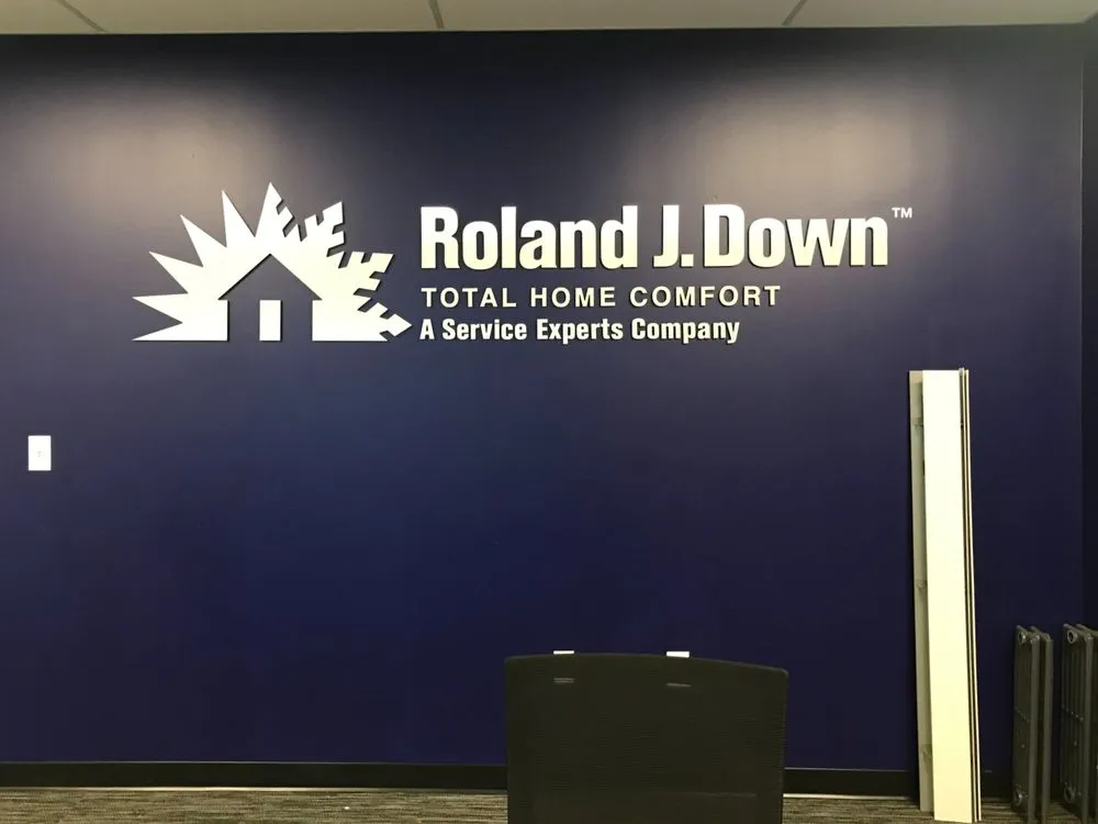 Slide of Roland J. Down Service Experts