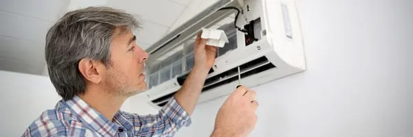 Rollmann Heating & Cooling Logo