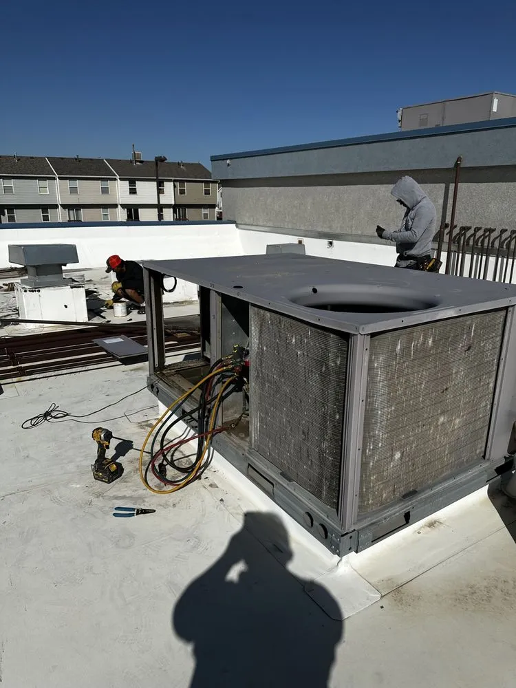 Slide of Roman's Heating & Cooling